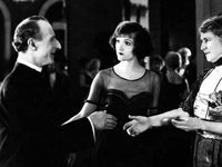 Arnold Lucy, Nellie Parker Spaulding, and Constance Talmadge in "Good References" (1920)